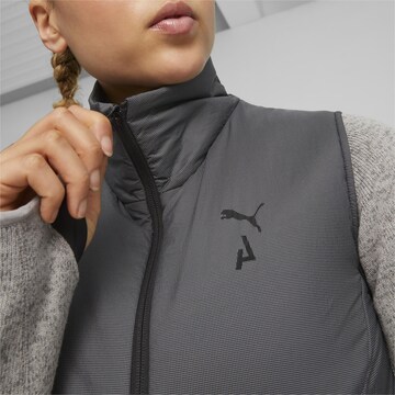 PUMA Sportbodywarmer 'Seasons' in Zwart