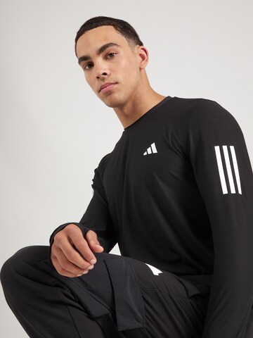 ADIDAS PERFORMANCETehnička sportska majica 'Own the Run' - crna boja