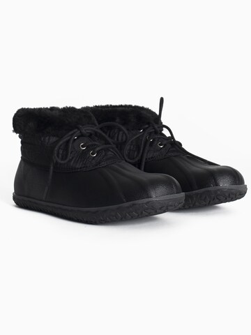 Bottines à lacets 'Tega' Minnetonka en noir