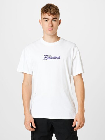 T-Shirt fonctionnel NIKE en blanc : devant