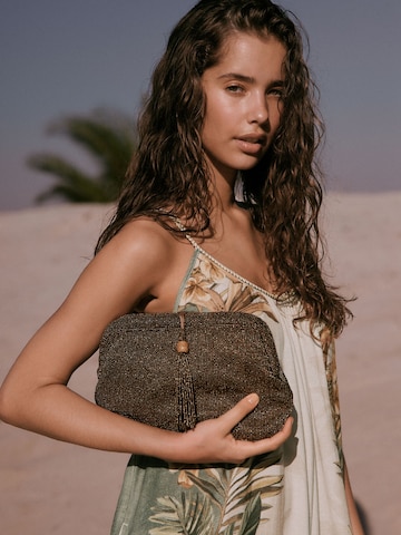 Pochette di Next in oro