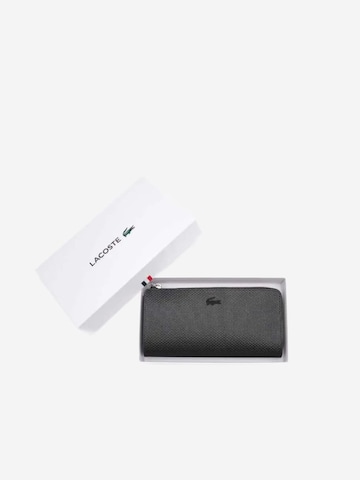 LACOSTE - Cartera 'Lacoste Compagnon cuir piqué Chantaco' en negro