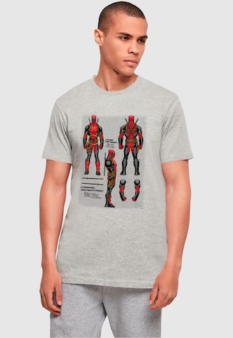 ABSOLUTE CULT T-Shirt 'Deadpool - Action Figure Plans' in Grau: predná strana