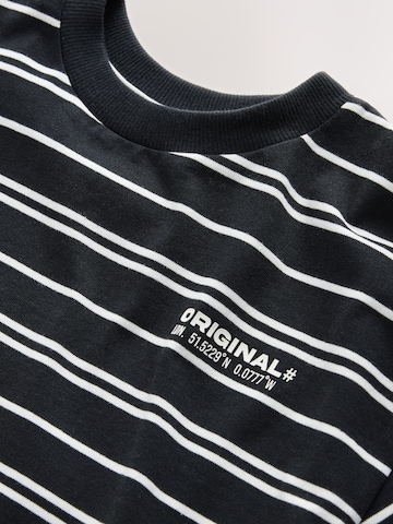 Next - Camiseta en negro