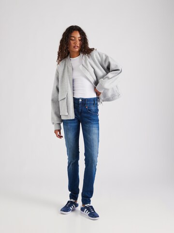 Coupe slim Jean Herrlicher en bleu