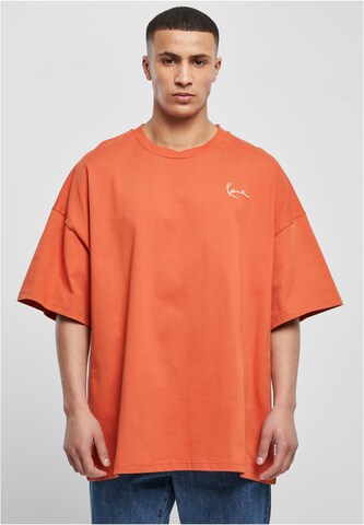 T-Shirt Karl Kani en orange : devant