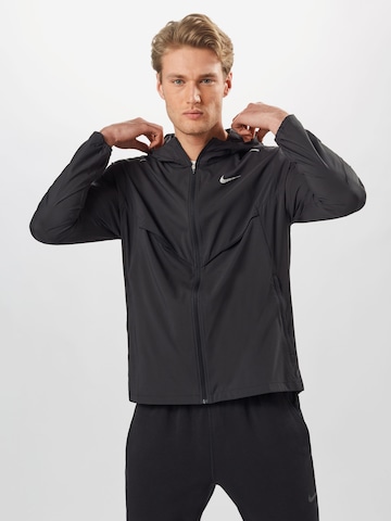 NIKE Athletic Jacket in Black: front