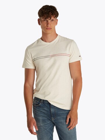 Tommy Jeans Koszulka w kolorze beżowy: przód