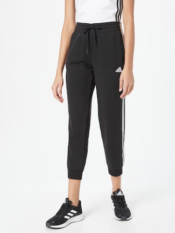 ADIDAS SPORTSWEAR Tapered Workout Pants 'Essentials Studio Lounge Cuffed 3-Stripes' in Black: front