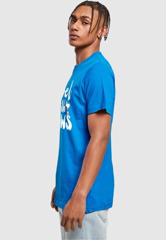 Merchcode Shirt 'Peanuts - Rebel with paws' in Blauw