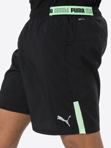 PUMA Loosefit Sportshorts in Schwarz