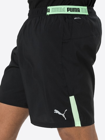 PUMA Loosefit Sportshorts in Schwarz