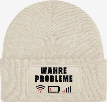 Youth Designz Mütze 'Wahre Probleme' in Beige: Vorderseite