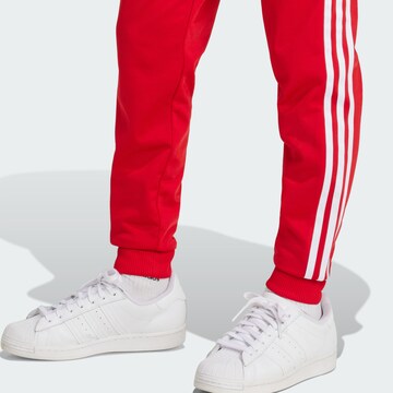 ADIDAS ORIGINALS Конический (Tapered) Штаны 'Adicolor Sst' в Красный