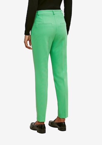 Coupe slim Pantalon à plis COMMA en vert : derrière