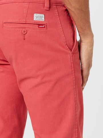 Tapered Pantaloni chino 'XX Chino Standard' di LEVI'S ® in rosso