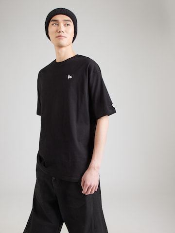 T-Shirt 'ESSNTIALS' NEW ERA en noir : devant