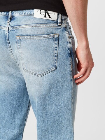 Calvin Klein Jeans تقليدي جينز بلون أزرق