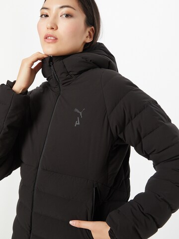 PUMA Sportjacke in Schwarz