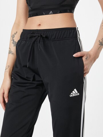 ADIDAS SPORTSWEAR regular Παντελόνι φόρμας 'Essentials Warm-Up 3-Stripes' σε μαύρο