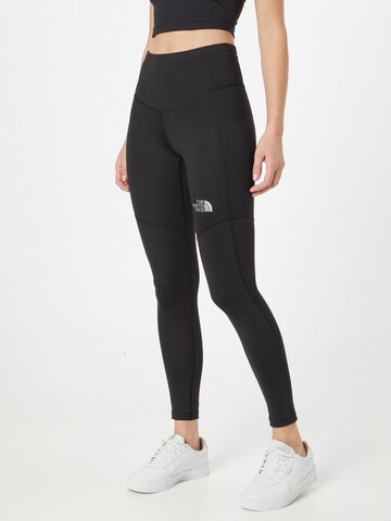 THE NORTH FACE Skinny Workout Pants in Black: front