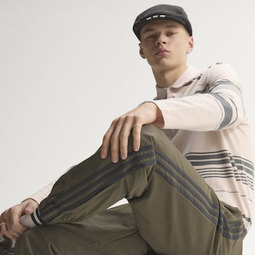 ADIDAS ORIGINALS Tapered Broek 'Firebird' in Bruin