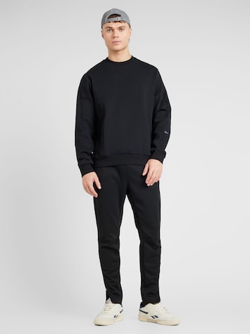 Reebok Sports sweatshirt in Black