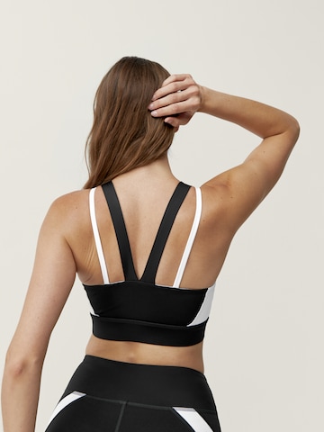 Born Living Yoga Sporttop 'Latika' in Zwart