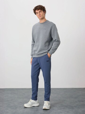 Sweat-shirt Tommy Life en gris