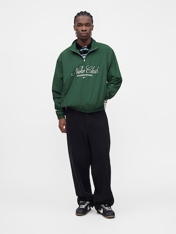 Nike Sportswear Prehodna jakna 'Club' | zelena barva