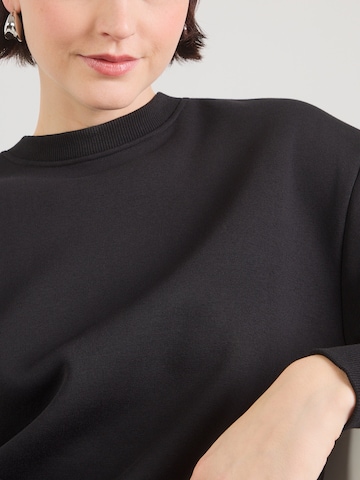 ABOUT YOU Sweatshirt 'Presley' in Black
