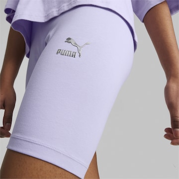 PUMA Skinny Spodnie sportowe 'Dare to Feelin' w kolorze fioletowy