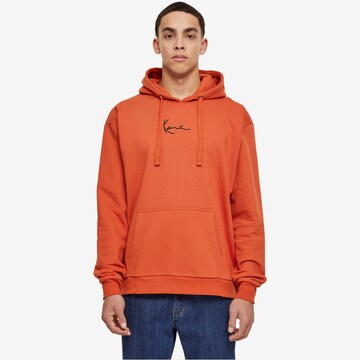 Karl Kani Sweatshirt 'KM-HD011-042-01 KK' i oransje: forside