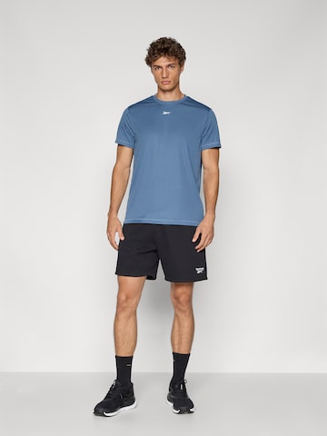 Tricou funcțional 'ID TRAIN' de la Reebok pe albastru