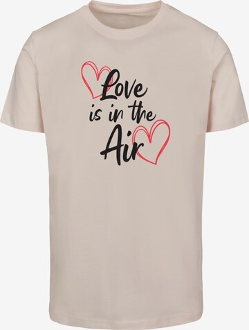 Merchcode T-Shirt 'Valentines Day - Love is in the Air' in Pink: predná strana