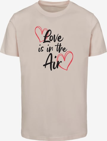 Merchcode T-Shirt 'Valentines Day - Love is in the Air' in Pink: predná strana