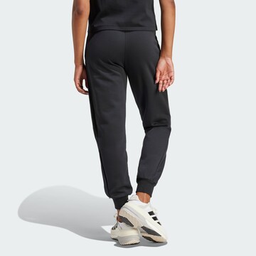 Effilé Pantalon de sport 'Z.N.E.' ADIDAS SPORTSWEAR en noir