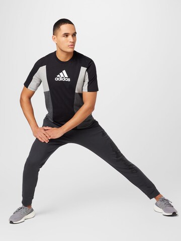 ADIDAS SPORTSWEAR - Camiseta funcional 'Essentials Colourblock' en negro