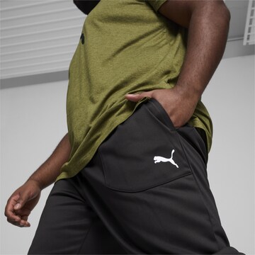 PUMA Tapered Sportbroek in Zwart