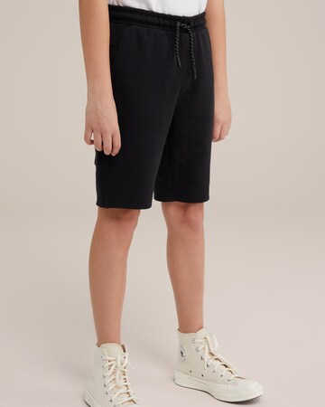 Slimfit Pantaloni de la WE Fashion pe negru: față