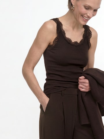 Top de la Rich & Royal pe maro