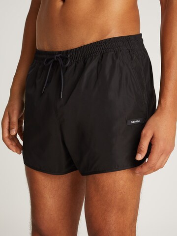 Calvin Klein Swimwear Kratke kopalne hlače 'RUNNER' | črna barva