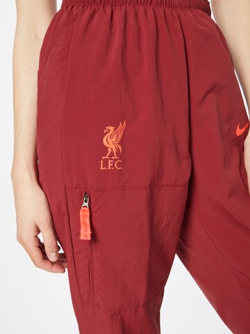 NIKE Alt kitsenev Spordipüksid 'Liverpool FC', värv punane