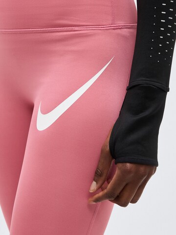 NIKESkinny Sportske hlače 'TEMPO' - roza boja