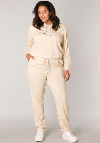 BASE LEVEL CURVY Regular Pleat-Front Pants in Beige