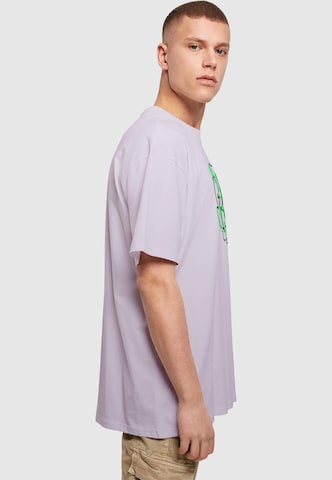 Merchcode T-Shirt 'Stay Safe' in Lila