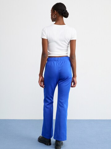 Nike Sportswear Flared Trousers in Blue