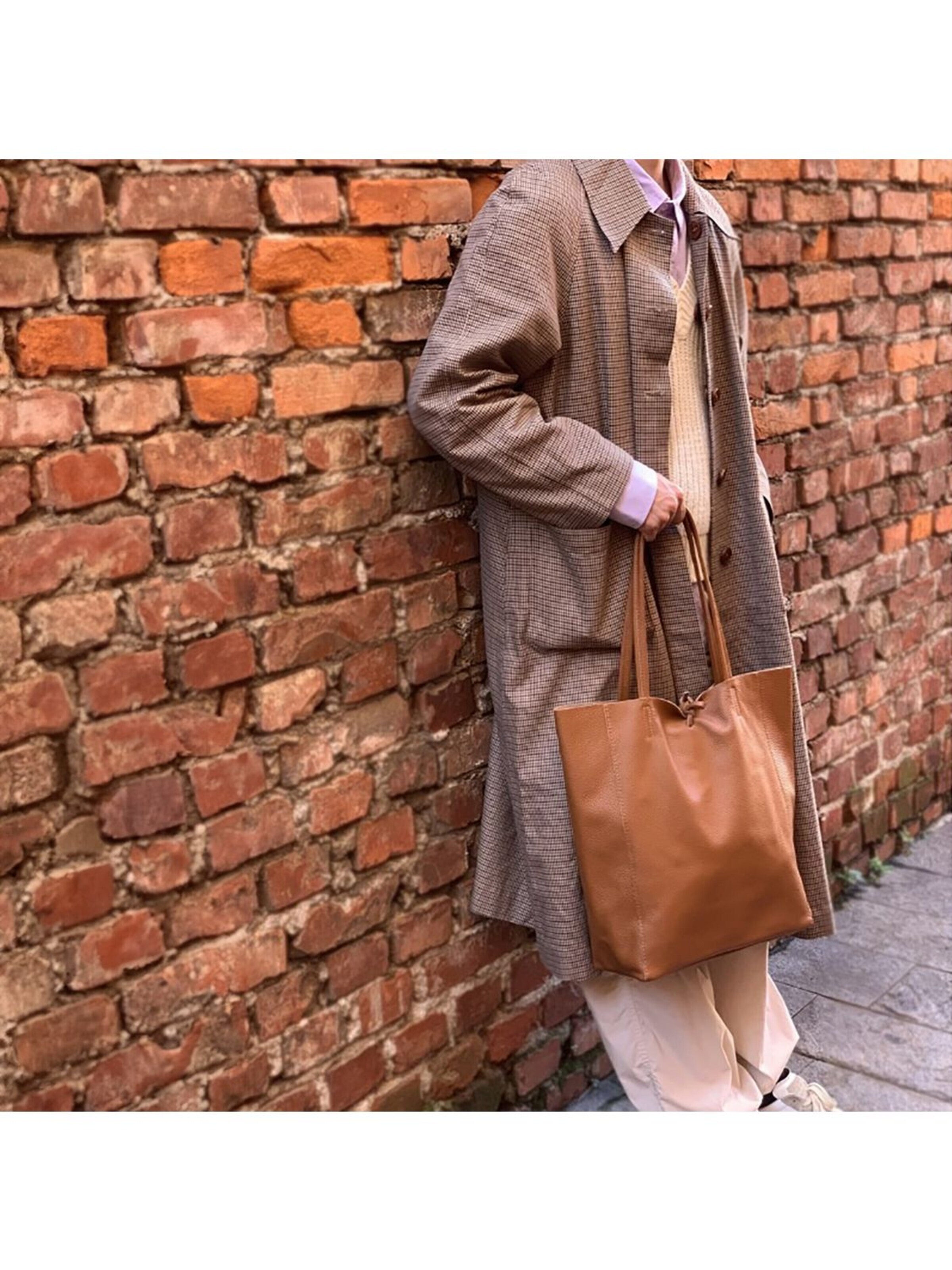 Florence Schoudertas in Bruin