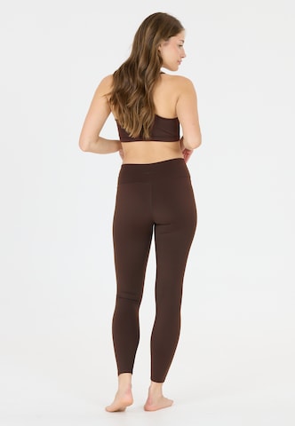 Athlecia Skinny Tights 'Blossom' in Braun