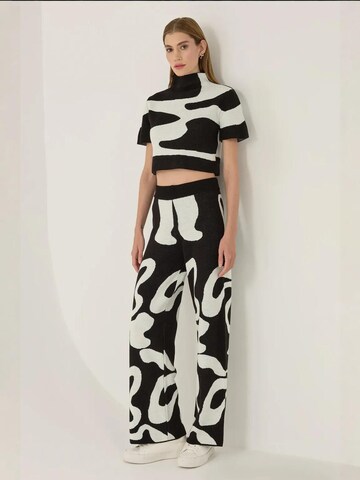 Hiccup - Perna larga Calças em preto